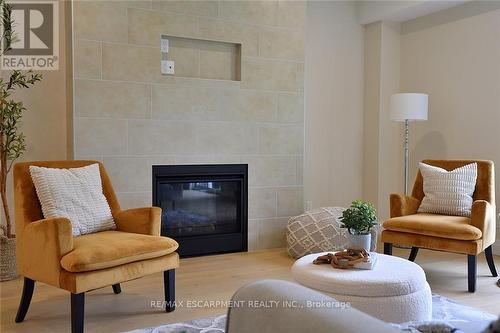 20 Clare Avenue, Hamilton (Hamilton Beach), ON - Indoor Photo Showing Living Room With Fireplace