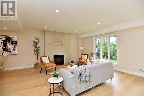 20 Clare Avenue, Hamilton (Hamilton Beach), ON - Indoor Photo Showing Living Room With Fireplace