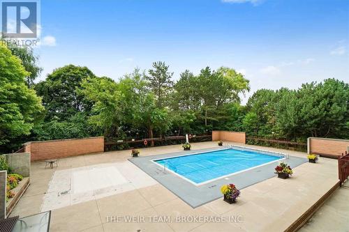 504 - 240 Scarlett Road, Toronto (Rockcliffe-Smythe), ON - Outdoor With In Ground Pool With Backyard