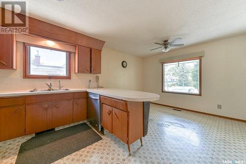 133 Mcmurchy Avenue, Regina, SK - Indoor Photo Showing Kitchen With Double Sink