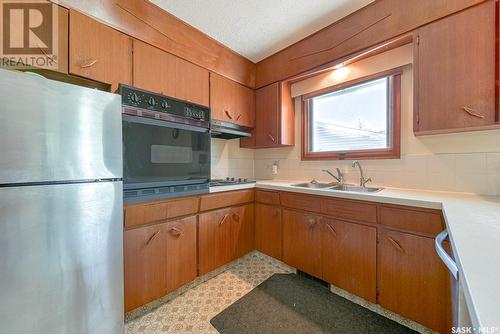 133 Mcmurchy Avenue, Regina, SK - Indoor Photo Showing Kitchen With Double Sink