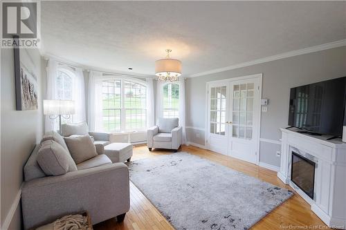 90 Nowlan Street, Grand-Sault/Grand Falls, NB - Indoor Photo Showing Living Room With Fireplace