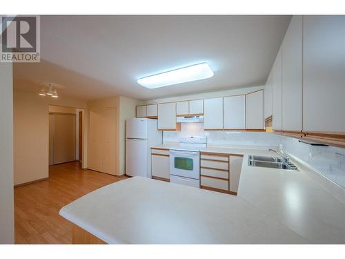 195 Warren Avenue Unit# 304, Penticton, BC - Indoor Photo Showing Kitchen With Double Sink