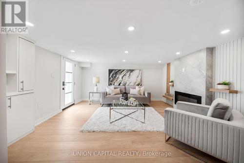 28 Pine Avenue, Toronto (The Beaches), ON - Indoor Photo Showing Living Room With Fireplace