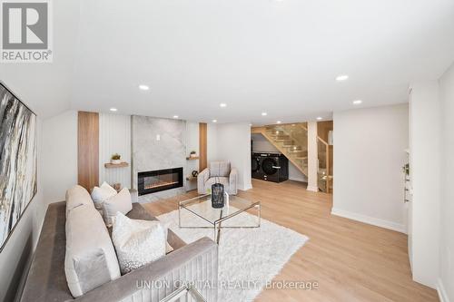 28 Pine Avenue, Toronto (The Beaches), ON - Indoor Photo Showing Living Room With Fireplace