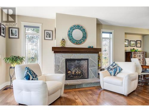 6148 Lipsett Avenue, Peachland, BC - Indoor Photo Showing Living Room With Fireplace