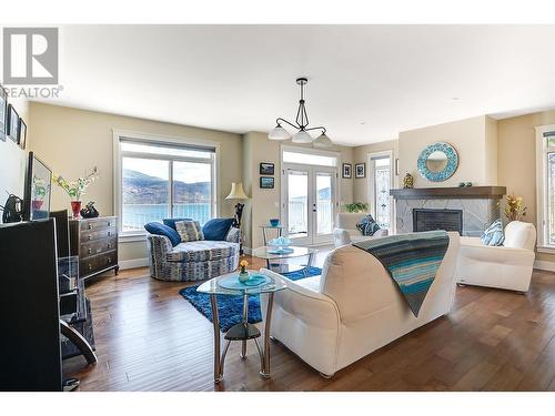 6148 Lipsett Avenue, Peachland, BC - Indoor Photo Showing Living Room With Fireplace