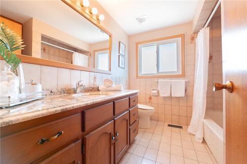 Large vanity is great for keeping all your personal items organized - 185 Nugent Drive, Hamilton, ON - Indoor Photo Showing Bathroom