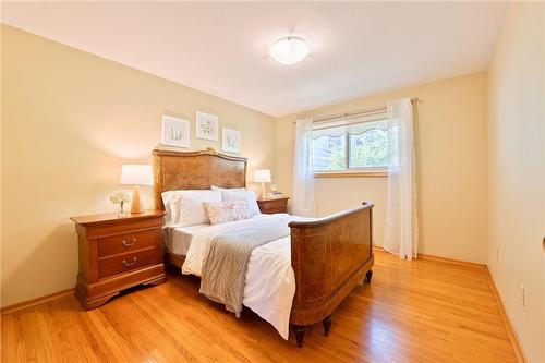 Large primary bedroom with hardwood floor - 185 Nugent Drive, Hamilton, ON - Indoor Photo Showing Bedroom