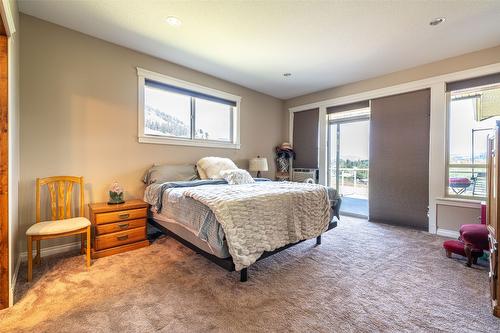 6205 6 Highway, Coldstream, BC - Indoor Photo Showing Bedroom