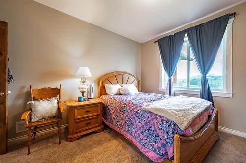 6205 6 Highway, Coldstream, BC - Indoor Photo Showing Bedroom