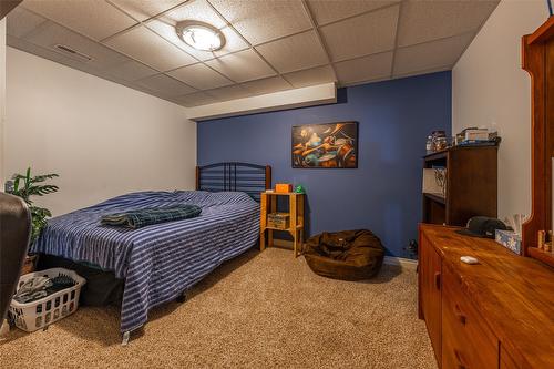 6205 6 Highway, Coldstream, BC - Indoor Photo Showing Bedroom