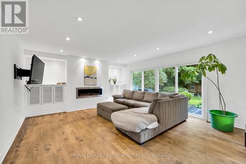 63 Idlewood Drive, Springwater (Midhurst), ON - Indoor Photo Showing Living Room With Fireplace