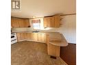 19 1700 S Broadway Avenue, Williams Lake, BC  - Indoor Photo Showing Kitchen With Double Sink 