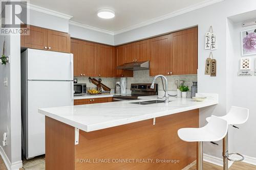 9 - 55 Cedarcroft Boulevard, Toronto (Westminster-Branson), ON - Indoor Photo Showing Kitchen With Double Sink