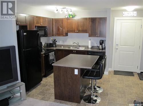 407 306 Petterson Drive, Estevan, SK - Indoor Photo Showing Kitchen With Double Sink