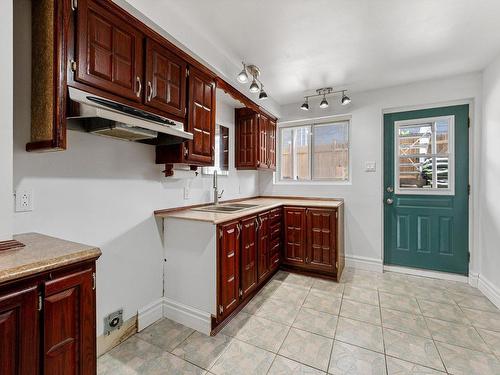 Kitchen - 1-9440 Rue Hochelaga, Montréal (Mercier/Hochelaga-Maisonneuve), QC - Indoor Photo Showing Kitchen With Double Sink