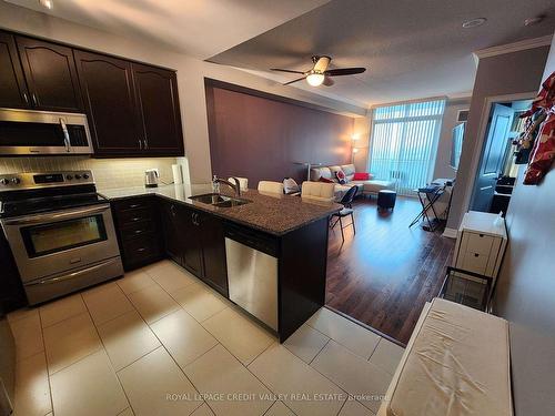 1707-100 John St, Brampton, ON - Indoor Photo Showing Kitchen With Stainless Steel Kitchen With Double Sink