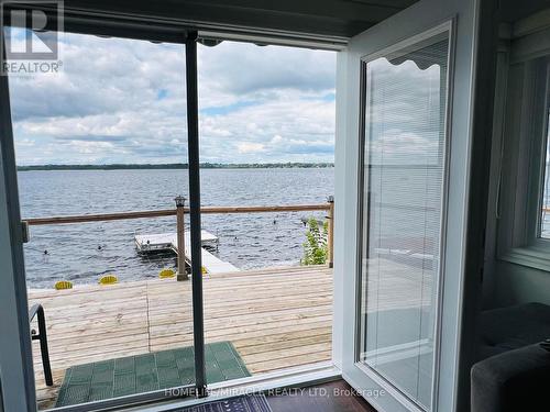 213 Snug Harbour Road, Kawartha Lakes, ON - Indoor Photo Showing Other Room With Body Of Water