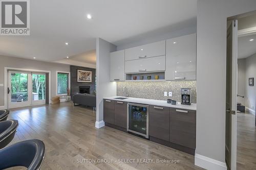 wet bar with beverage fridge - 1 - 570 Windermere Road, London, ON - Indoor