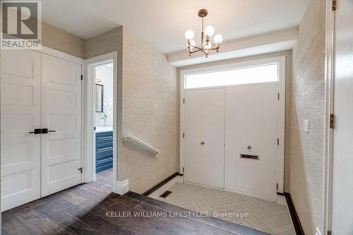 Original grasscloth wallpaper in foyer - 411 Lawson Road, London, ON - Indoor Photo Showing Other Room