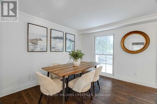 Floor-to-ceiling window in dining room - 411 Lawson Road, London, ON - Indoor Photo Showing Dining Room