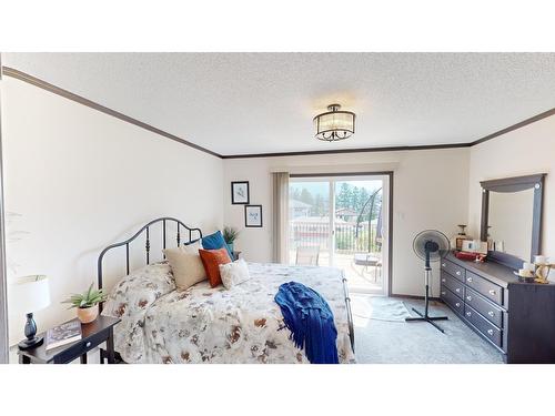 513 Pagurut Avenue W, Cranbrook, BC - Indoor Photo Showing Bedroom