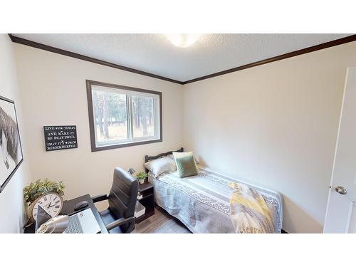 513 Pagurut Avenue W, Cranbrook, BC - Indoor Photo Showing Bedroom