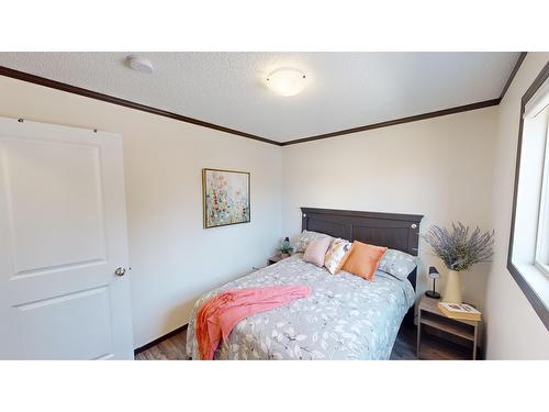 513 Pagurut Avenue W, Cranbrook, BC - Indoor Photo Showing Bedroom