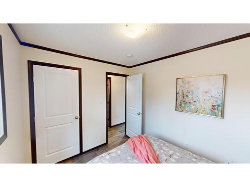 513 Pagurut Avenue W, Cranbrook, BC - Indoor Photo Showing Bedroom