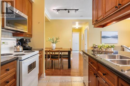 205 - 35 Boardwalk Drive, Toronto (The Beaches), ON - Indoor Photo Showing Kitchen With Double Sink