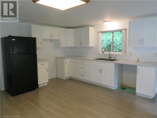 303 W Sauk Court Nw, Point Clark, ON - Indoor Photo Showing Kitchen With Double Sink