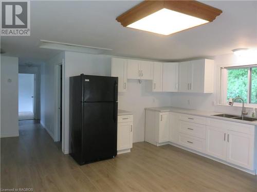 303 W Sauk Court Nw, Point Clark, ON - Indoor Photo Showing Kitchen With Double Sink