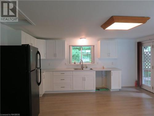 303 W Sauk Court Nw, Point Clark, ON - Indoor Photo Showing Kitchen With Double Sink