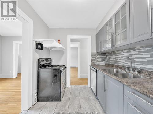 92-94 Hanna Street, Windsor, ON - Indoor Photo Showing Kitchen With Double Sink