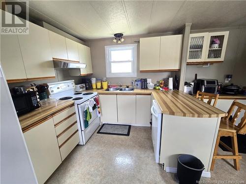 28 Parc P'Tiso Street, Edmundston, NB - Indoor Photo Showing Kitchen With Double Sink