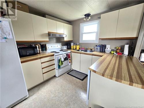 28 Parc P'Tiso Street, Edmundston, NB - Indoor Photo Showing Kitchen With Double Sink