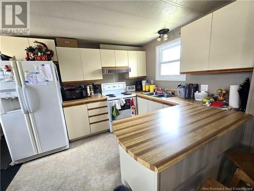 28 Parc P'Tiso Street, Edmundston, NB - Indoor Photo Showing Kitchen With Double Sink