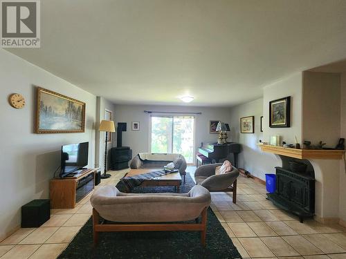 6513 Monette Road, 100 Mile House, BC - Indoor Photo Showing Living Room With Fireplace