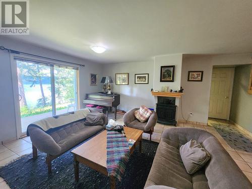 6513 Monette Road, 100 Mile House, BC - Indoor Photo Showing Living Room With Fireplace