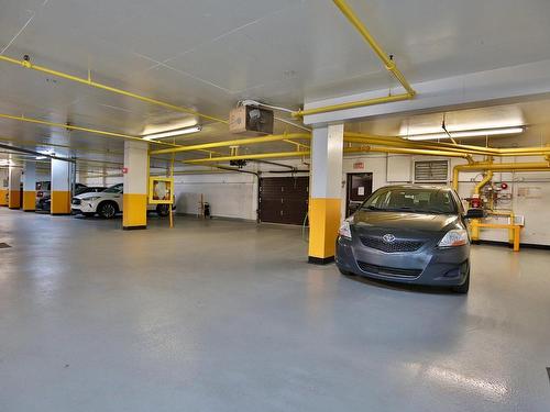 Garage - 204-8075 Boul. St-Laurent, Brossard, QC - Indoor Photo Showing Garage