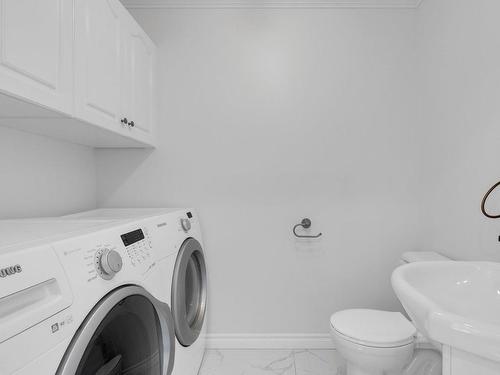 Powder room - 3425 Ch. De La Rivière-Cachée, Boisbriand, QC - Indoor Photo Showing Laundry Room