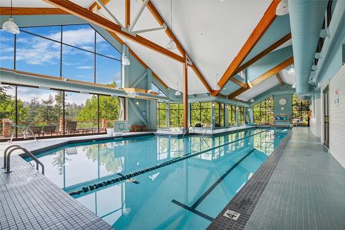 253 Dormie Place, Vernon, BC - Indoor Photo Showing Other Room With In Ground Pool