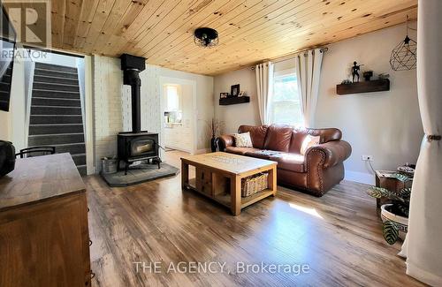 3459 Brennan Line, Severn (West Shore), ON - Indoor Photo Showing Living Room With Fireplace