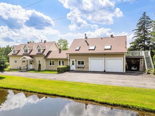 Back facade - 1260 Ch. De Magoon Point, Stanstead - Canton, QC - Outdoor With Body Of Water With Facade