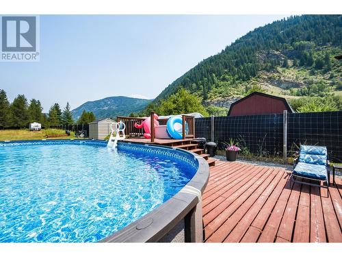 934 Hillview Road, Ootischenia, BC - Outdoor With Above Ground Pool With Deck Patio Veranda