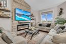 810 Evergreen Boulevard, Saskatoon, SK  - Indoor Photo Showing Living Room With Fireplace 