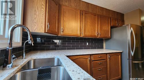 205 2160 Cornwall Street, Regina, SK - Indoor Photo Showing Kitchen With Double Sink