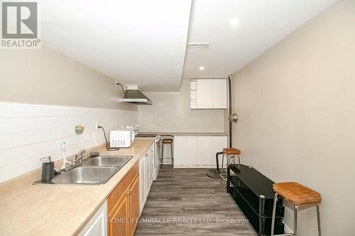 312 Carriage Way, Waterloo, ON - Indoor Photo Showing Kitchen With Double Sink