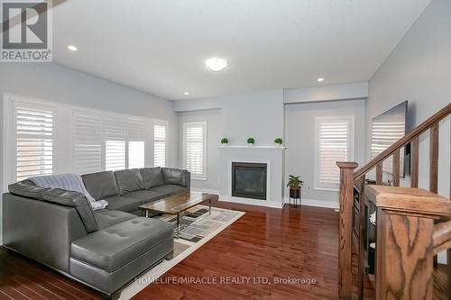 312 Carriage Way, Waterloo, ON - Indoor Photo Showing Living Room With Fireplace